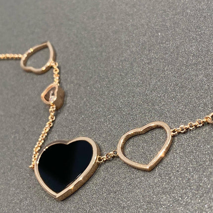 HAPPY HEART ONYX PINK GOLD BRACELET