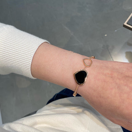HAPPY HEART ONYX PINK GOLD BRACELET
