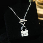 Silver alloy - 14k gold plated ( no box )