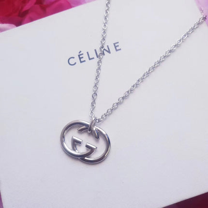 GUCCI 26S INTERLOCKING G LOGO PENDANT NECKLACE IN SILVER TONE METAL