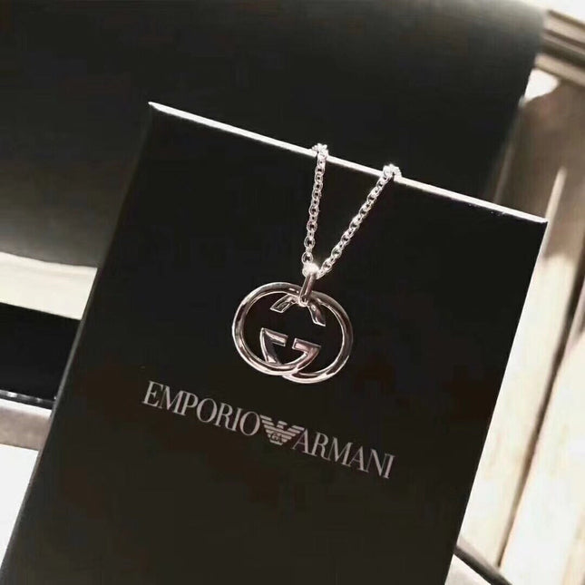 GUCCI 26S INTERLOCKING G LOGO PENDANT NECKLACE IN SILVER TONE METAL