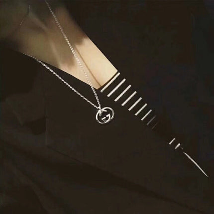 GUCCI 26S INTERLOCKING G LOGO PENDANT NECKLACE IN SILVER TONE METAL
