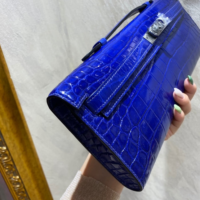 KELLY CUT 31 IN ADMIRAL BLUE SHINNY ALLIGATOR LEATHER WITH SILVER HARDWARE