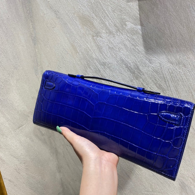 KELLY CUT 31 IN ADMIRAL BLUE SHINNY ALLIGATOR LEATHER WITH SILVER HARDWARE