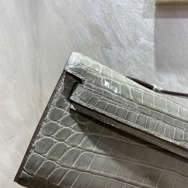 KELLY CUT 31 IN ASH GRAY SHINNY ALLIGATOR LEATHER WITH SILVER HARDWARE