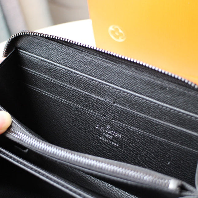 LV 25S ZIPPY WALLET HORIZONTAL 19 IN MONOGRAM ECLIPSE COATED CALFSKIN