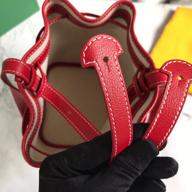 PETIT FLOT BUCKET BAG 22 IN CLASSIC RED GOYARDINE CANVAS AND LAMBSKIN TRIM
