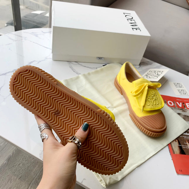 LOEWE 26S ANAGRAM FLAP SNEAKERS IN YELLOW CANVAS