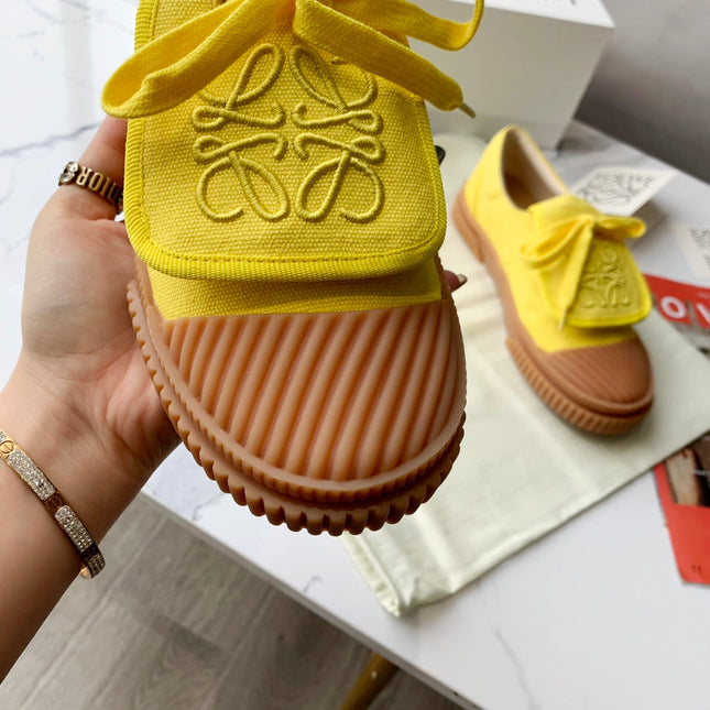 LOEWE 26S ANAGRAM FLAP SNEAKERS IN YELLOW CANVAS