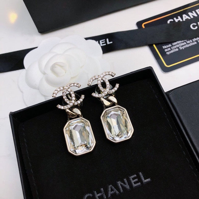 CHANEL 26S DOUBLE C LOGO CRYSTAL OCTAGON CLEAR STONE DROP EARRINGS IN GOLD METAL 6310872