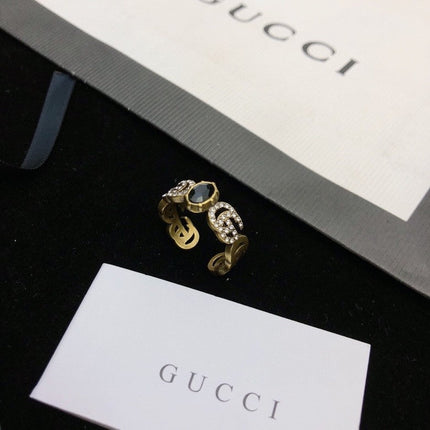 GUCCI 26S DOUBLE G LOGO BLACK CRYSTAL STUD EARRINGS IN ANTIQUE GOLD TONE METAL 627926
