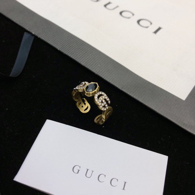 GUCCI 26S DOUBLE G LOGO BLACK CRYSTAL STUD EARRINGS IN ANTIQUE GOLD TONE METAL 627926