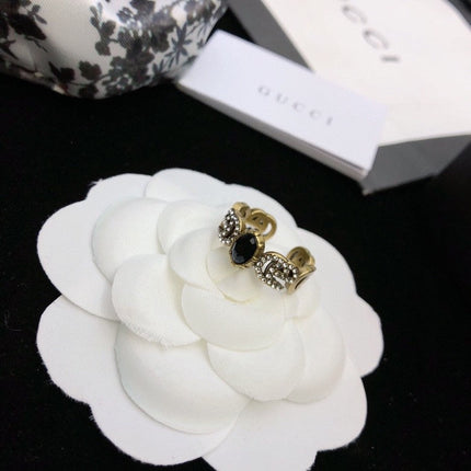 GUCCI 26S DOUBLE G LOGO BLACK CRYSTAL STUD EARRINGS IN ANTIQUE GOLD TONE METAL 627926