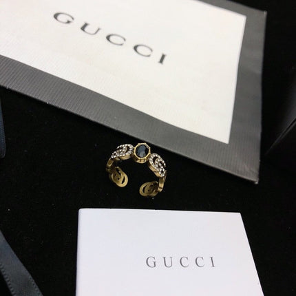 GUCCI 26S DOUBLE G LOGO BLACK CRYSTAL STUD EARRINGS IN ANTIQUE GOLD TONE METAL 627926