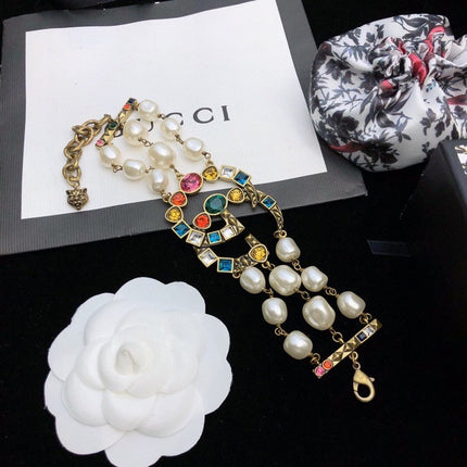 GUCCI 26S GG MULTICOLOR GEM PEARL CHAIN BRACELET IN GOLD TONE METAL 624209