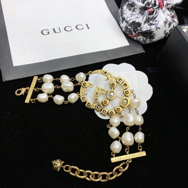 GUCCI 26S GG MULTICOLOR GEM PEARL CHAIN BRACELET IN GOLD TONE METAL 624209