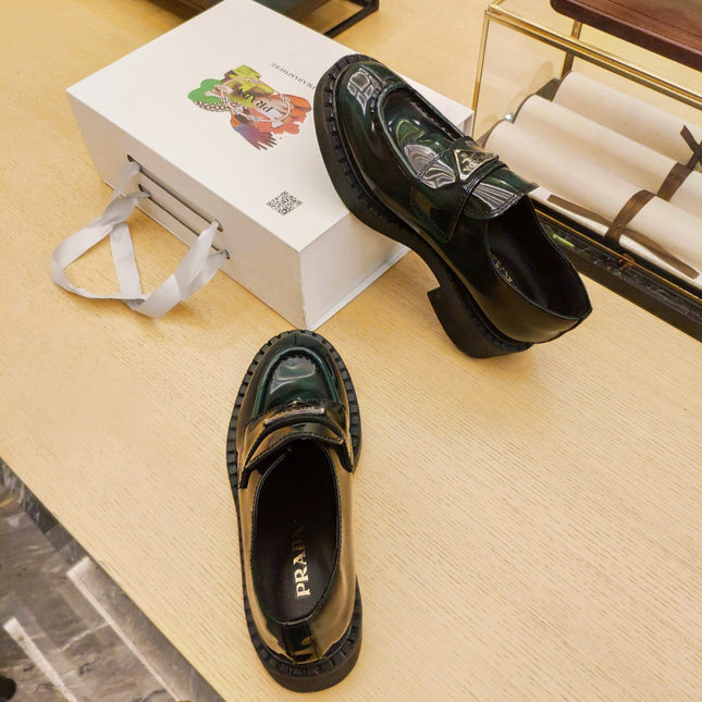 PRADA 26S PENNY LOAFERS 55MM IN GREEN PATENT CALFSKIN