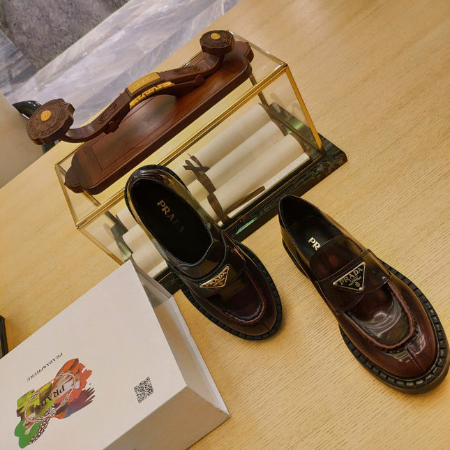 PRADA 26S PENNY LOAFERS 55MM IN BURGUNDY RED PATENT CALFSKIN