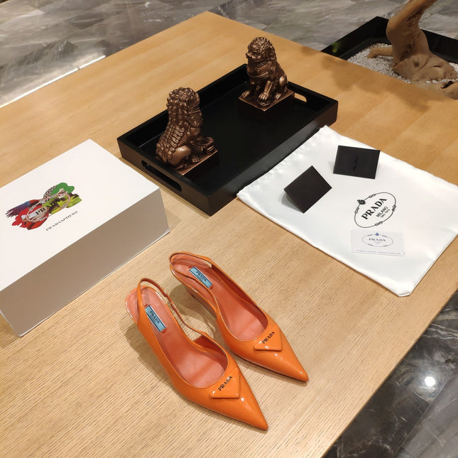 PRADA 26S POINTED TOE WEDGE SLINGBACK PUMPS IN ORANGE PATENT CALFSKIN