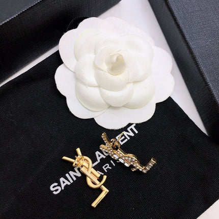 YSL 26S BAGUETTE CRYSTAL LOGO DROP EARRINGS IN GOLD TONE METAL 629136