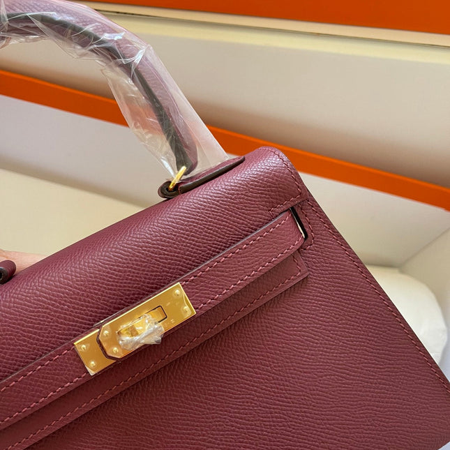 KELLY MINI 20 BAG IN GARNET RED CALFSKIN WITH GOLD HARDWARE