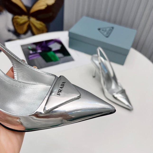 PRADA 26S SLINGBACK PUMPS STILETTO HEEL 95MM IN SILVER PATENT CALFSKIN LOGO