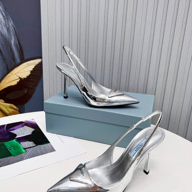 PRADA 26S SLINGBACK PUMPS STILETTO HEEL 95MM IN SILVER PATENT CALFSKIN LOGO