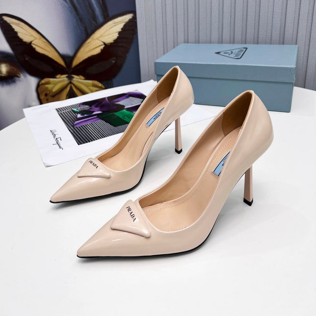 PRADA 26S POINTED TOE PUMPS STILETTO HEEL 95MM IN NUDE BEIGE PATENT CALFSKIN LOGO