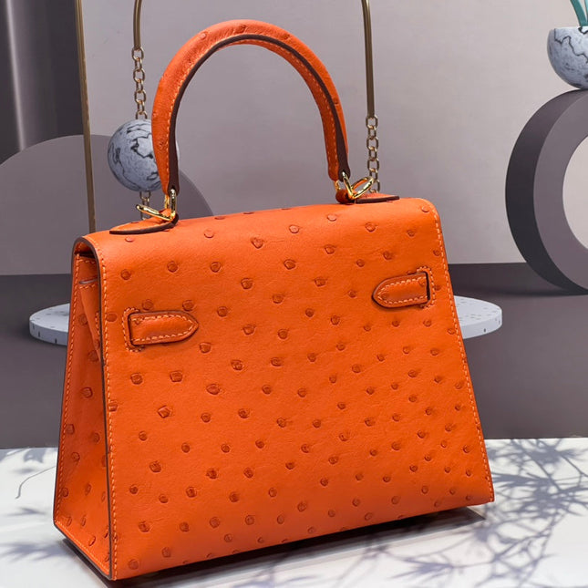KELLY BAG 20 IN FIRE ORANGE OSTRICH LEATHER WITH GOLD HARDWARE