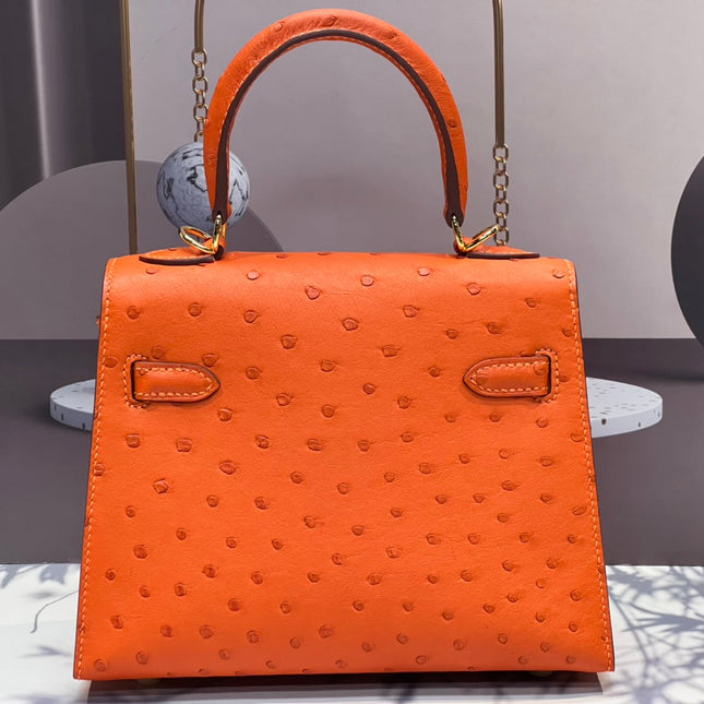KELLY BAG 20 IN FIRE ORANGE OSTRICH LEATHER WITH GOLD HARDWARE