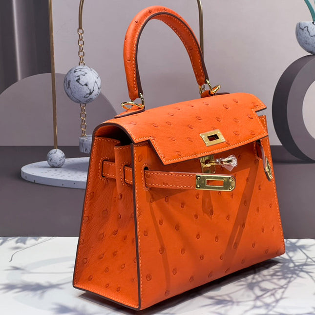 KELLY BAG 20 IN FIRE ORANGE OSTRICH LEATHER WITH GOLD HARDWARE