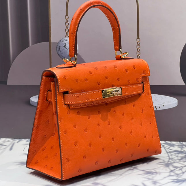 KELLY BAG 20 IN FIRE ORANGE OSTRICH LEATHER WITH GOLD HARDWARE