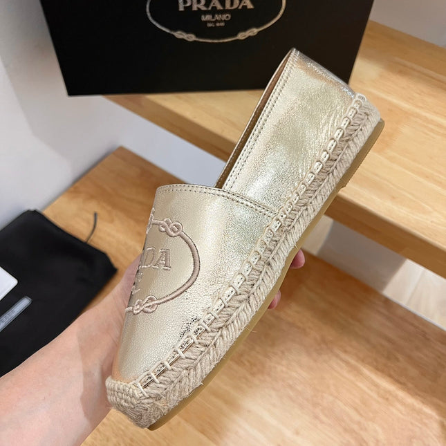 PRADA 26S EMBROIDERED LOGO ESPADRILLE FLATS IN GOLD CALFSKIN