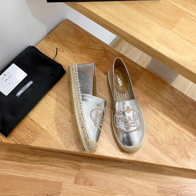 PRADA 26S EMBROIDERED LOGO ESPADRILLE FLATS IN SILVER CALFSKIN