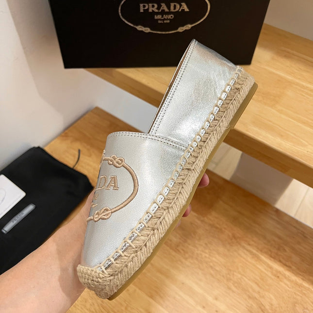 PRADA 26S EMBROIDERED LOGO ESPADRILLE FLATS IN SILVER CALFSKIN