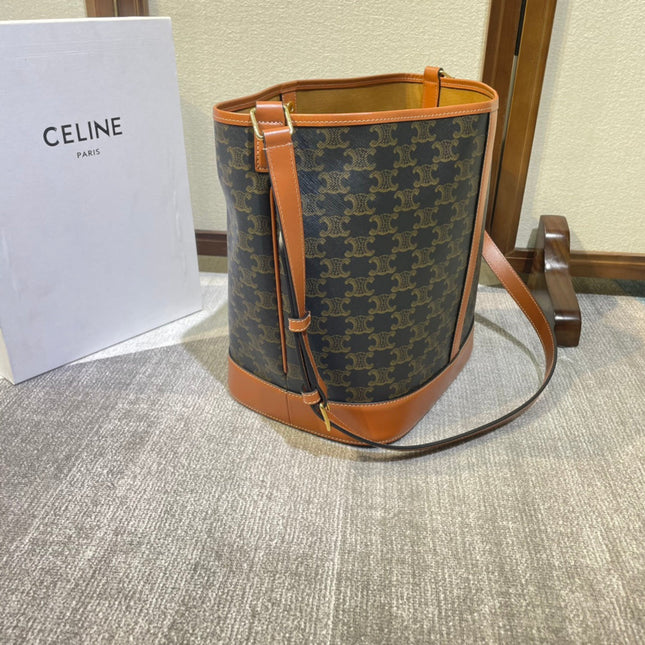 BUCKET 33 IN BLACK TRIOMPHE CANVAS AND BRONZE BROWN CALFSKIN TRIM