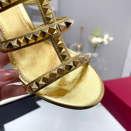 VALENTINO 26S ROCKSTUD STRAPPY BLOCK HEEL SLIDE SANDALS IN GOLD CALFSKIN