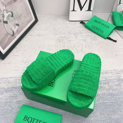 BOTTEGA VENETA 26S SLIDES IN GREEN FABRIC