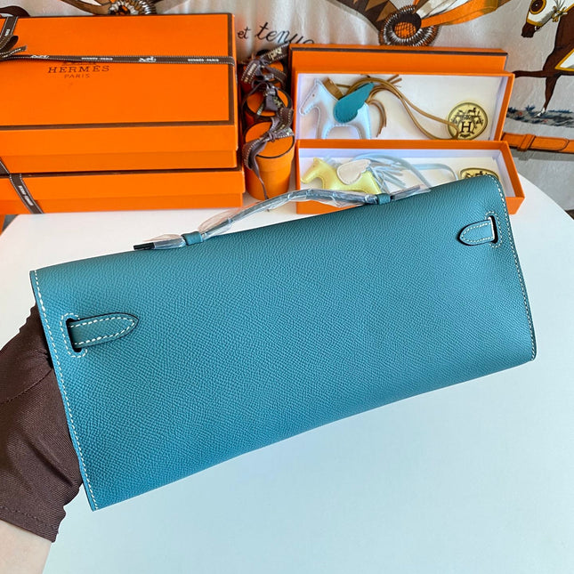 KELLY CUT 31 IN AZURE BLUE CALFSKIN WITH GOLD HARDWARE