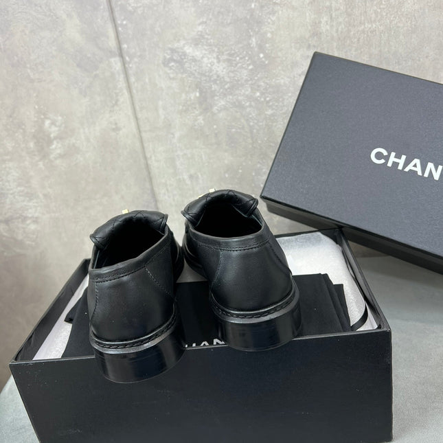 CHANEL 26S LOAFERS IN BLACK QUILTED CALFSKIN WITH CC LOGO