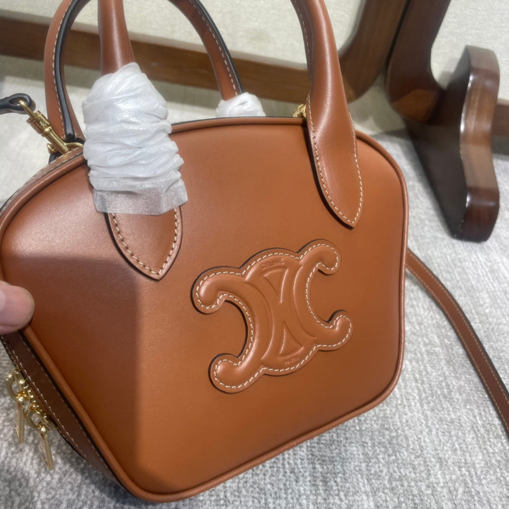 TRIOMPHE TOP HANDLE BAG 20 IN BRONZE BROWN CALFSKIN