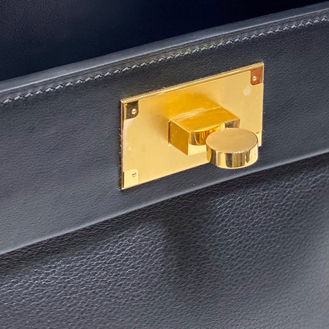 MINI 24/24 21CM IN BLACK EVERCOLOR CALFSKIN GOLD KELLY BUCKLE