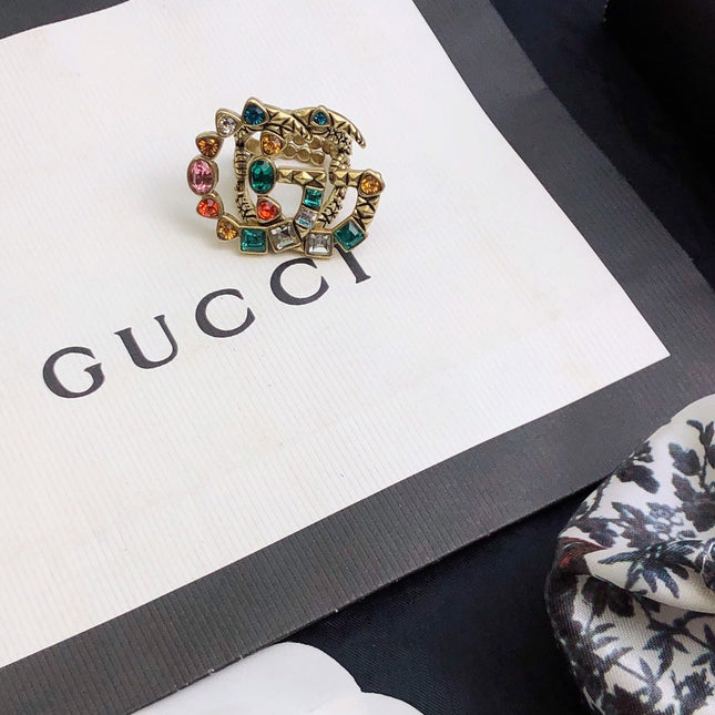 GUCCI 26S GG MULTICOLOR GEM EMBELLISHED BROOCH IN AGED GOLD TONE METAL 624288
