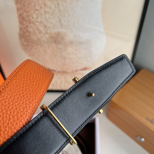 HM ROYAL BELT BUCKLE & REVERSIBLE NOIR AND ORANGE LEATHER STRAP 32 MM GOLD HARDWARE