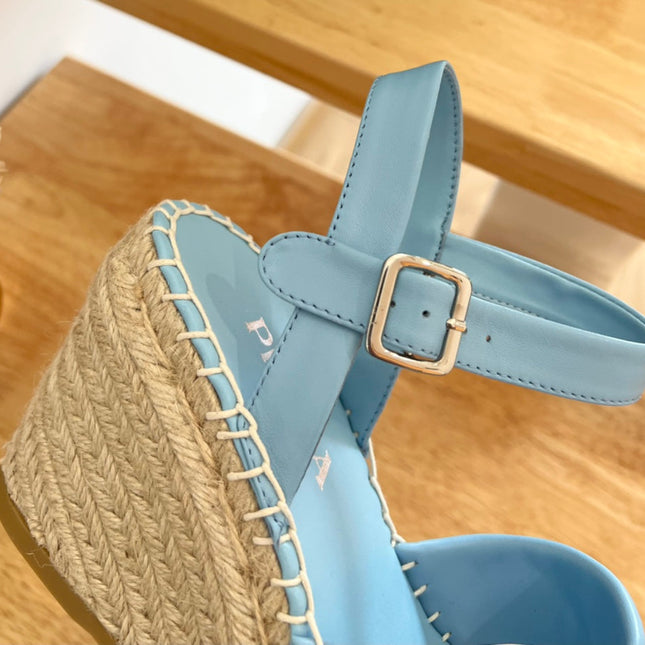 PRADA 26S CROSS STRAP ESPADRILLE WEDGE SANDALS IN SKY BLUE CALFSKIN