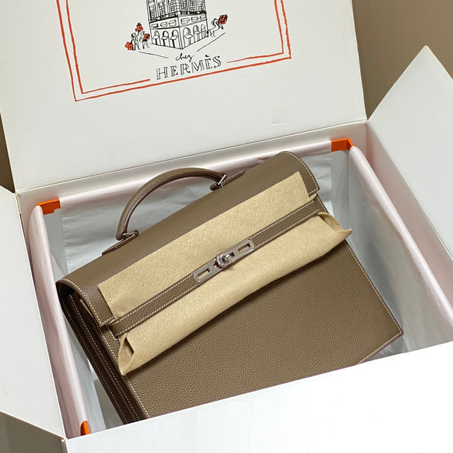 KELLY DEPECHES 34 BRIEFCASE IN ETOUPE TOGO CALFSKIN SILVER HARDWARE