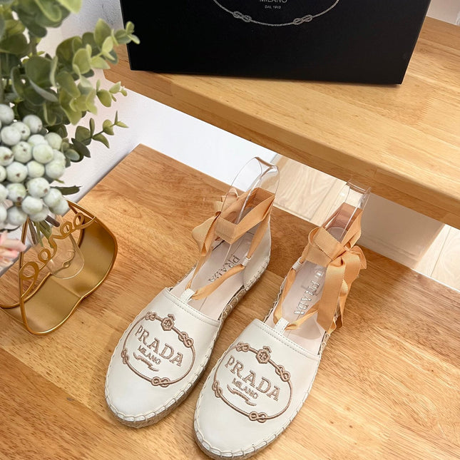 PRADA 26S LACE UP ESPADRILLE FLATS IN CREAM WHITE CALFSKIN