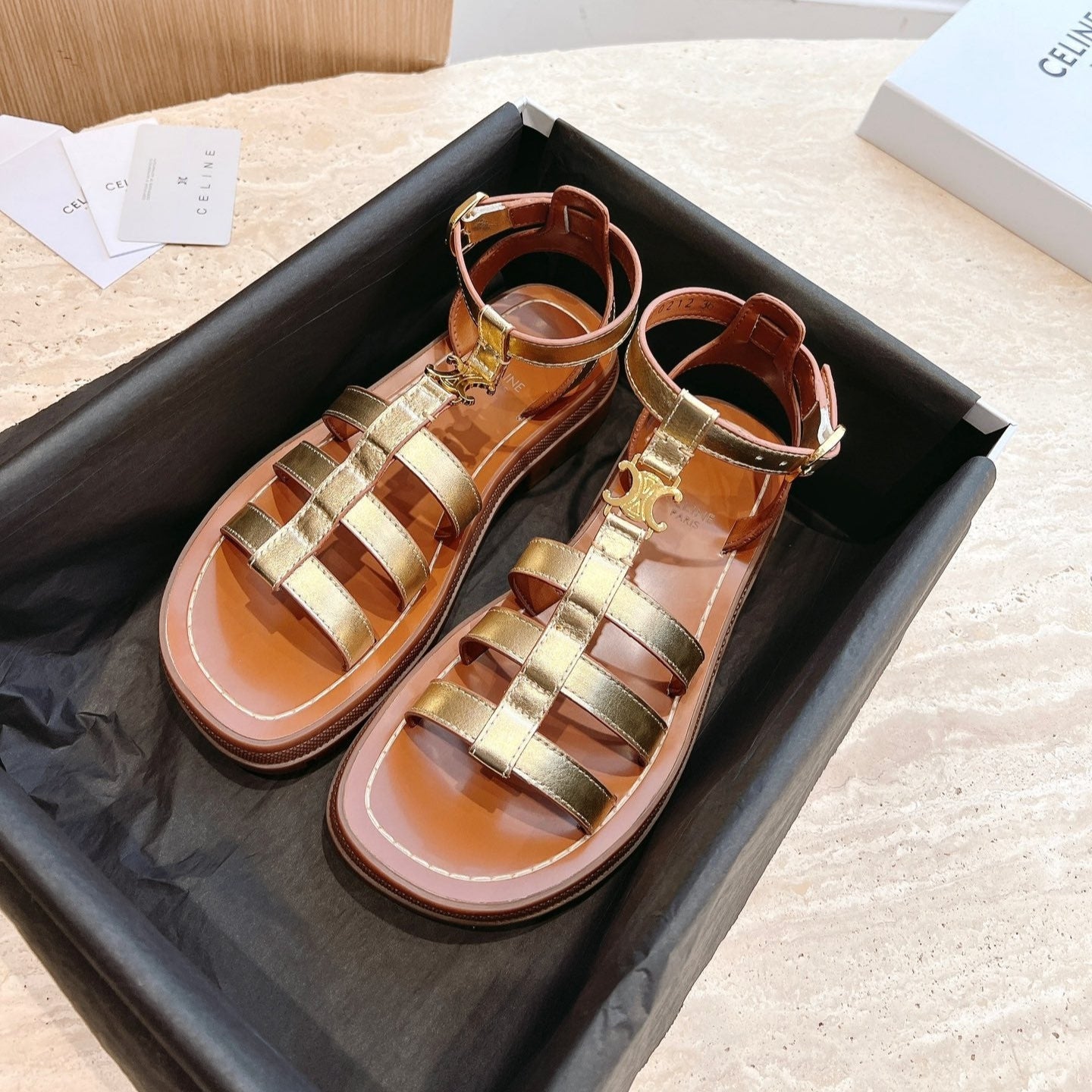 LYMPIA GLADIATOR SANDAL IN GOLD METALLIC CALFSKIN