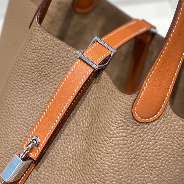 HERMES 25S PICOTIN LOCK 18 IN BURNT ORANGE AND BROWN CALFSKIN SILVER HARDWARE