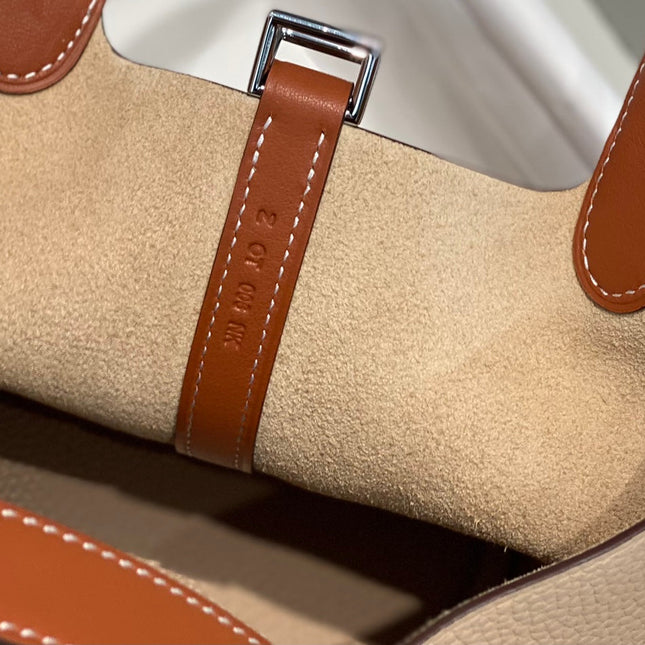 HERMES 25S PICOTIN LOCK 18 IN BURNT ORANGE AND LIGHT BROWN CALFSKIN SILVER HARDWARE